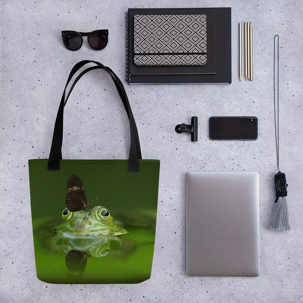 playful frog in puddle tote with delicate butterfly perched on nose print