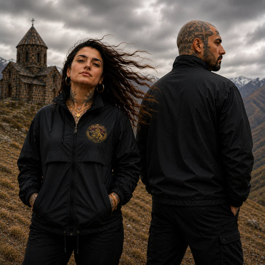 Armenian Pride black windbreaker worn by tattooed young couple showing front and back in dramatic mountain landscape