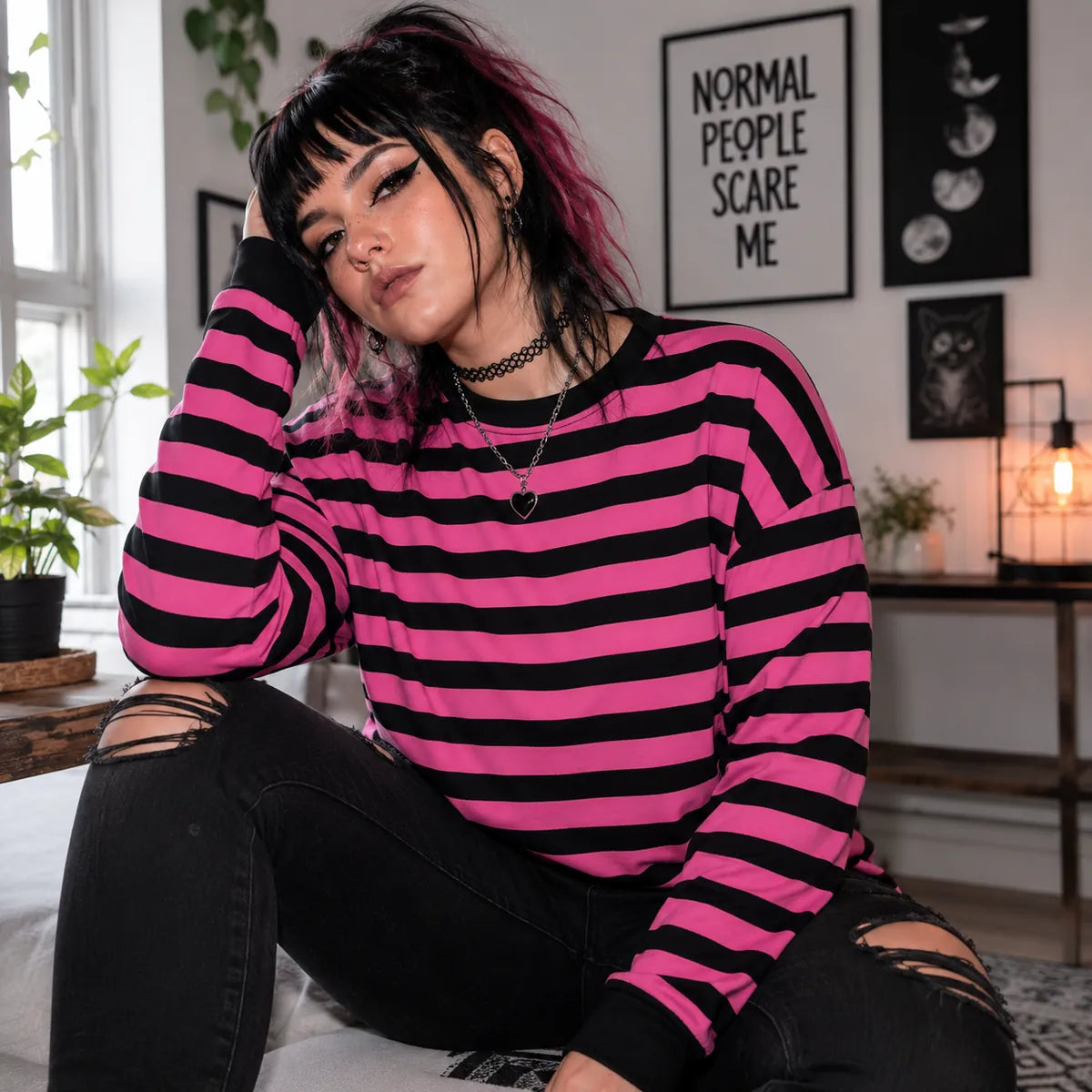 Black and pink striped long sleeve sweatshirt with gothic inspired outfit