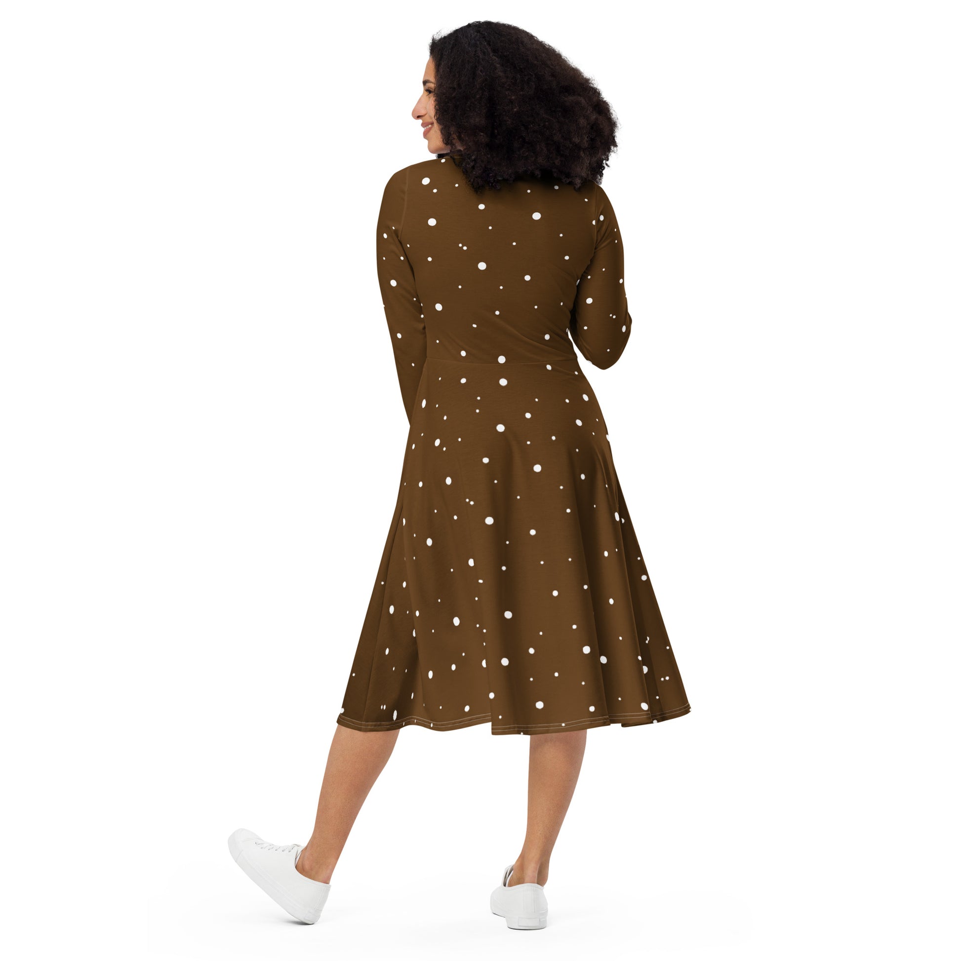 Elegant polka dot dress with boat neckline and flared skirt