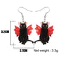 Black cat earrings with red devil horns and wings - a stylish and unique accessory for any occasion