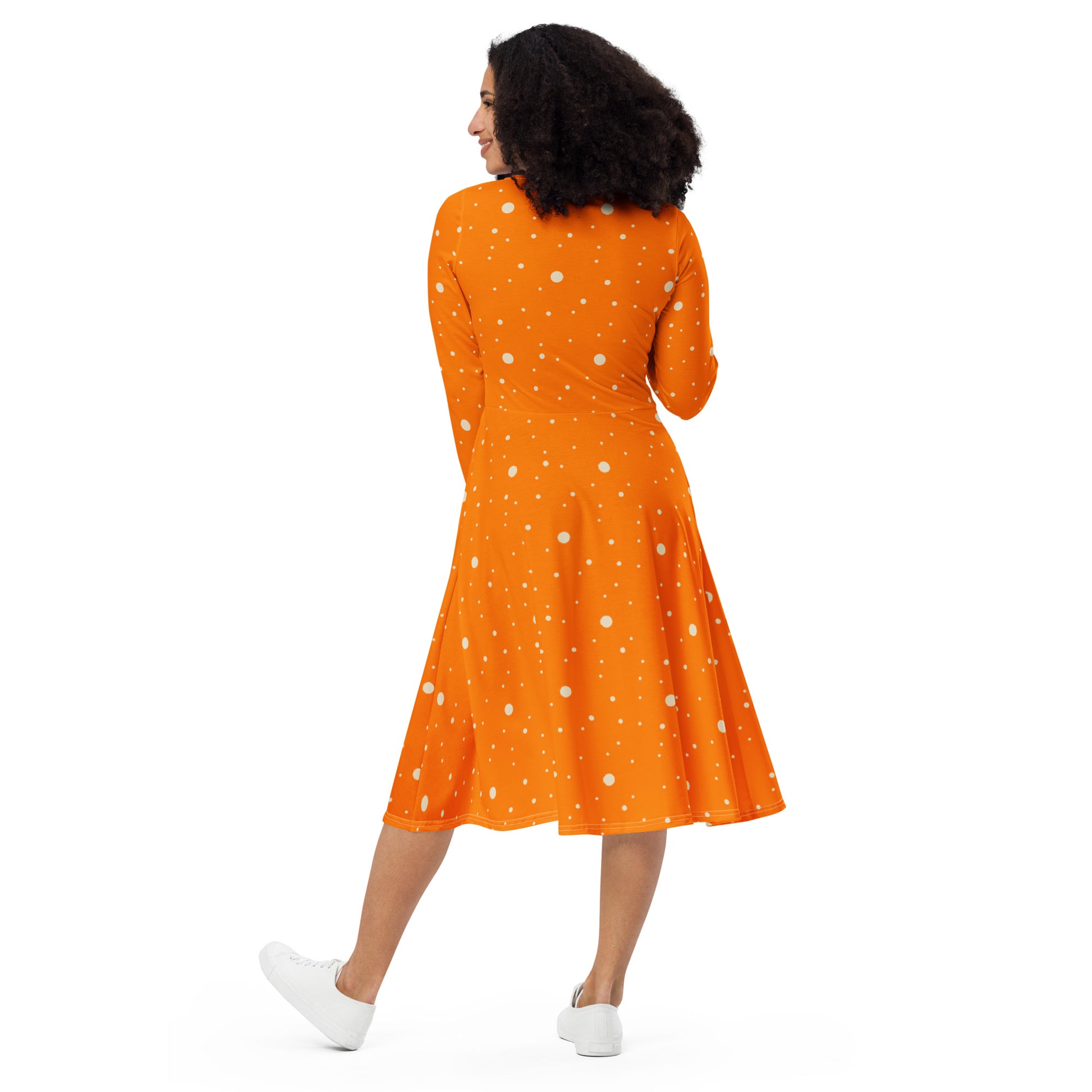 Orange and white polka dot dress with long sleeves back view