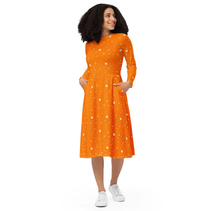 Orange and white polka dot dress with long sleeves front view