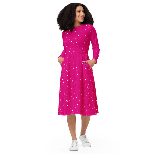 Pink and white polka dot midi dress with long sleeves and flared skirt