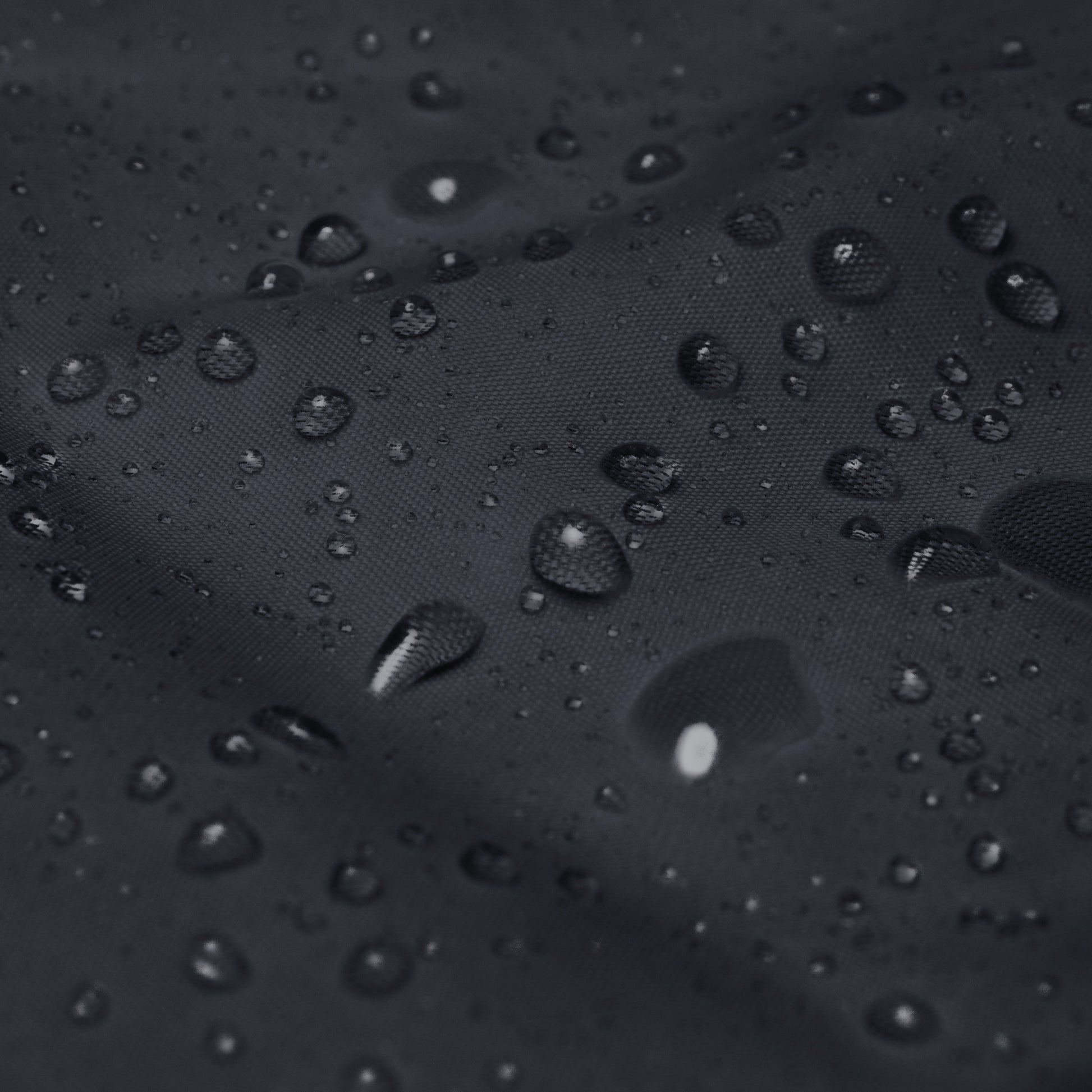 Water-resistant fabric with rain droplets on Armenian Pride windbreaker jacket