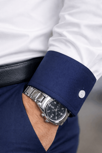 White dress shirt with close up blue cuffs 
