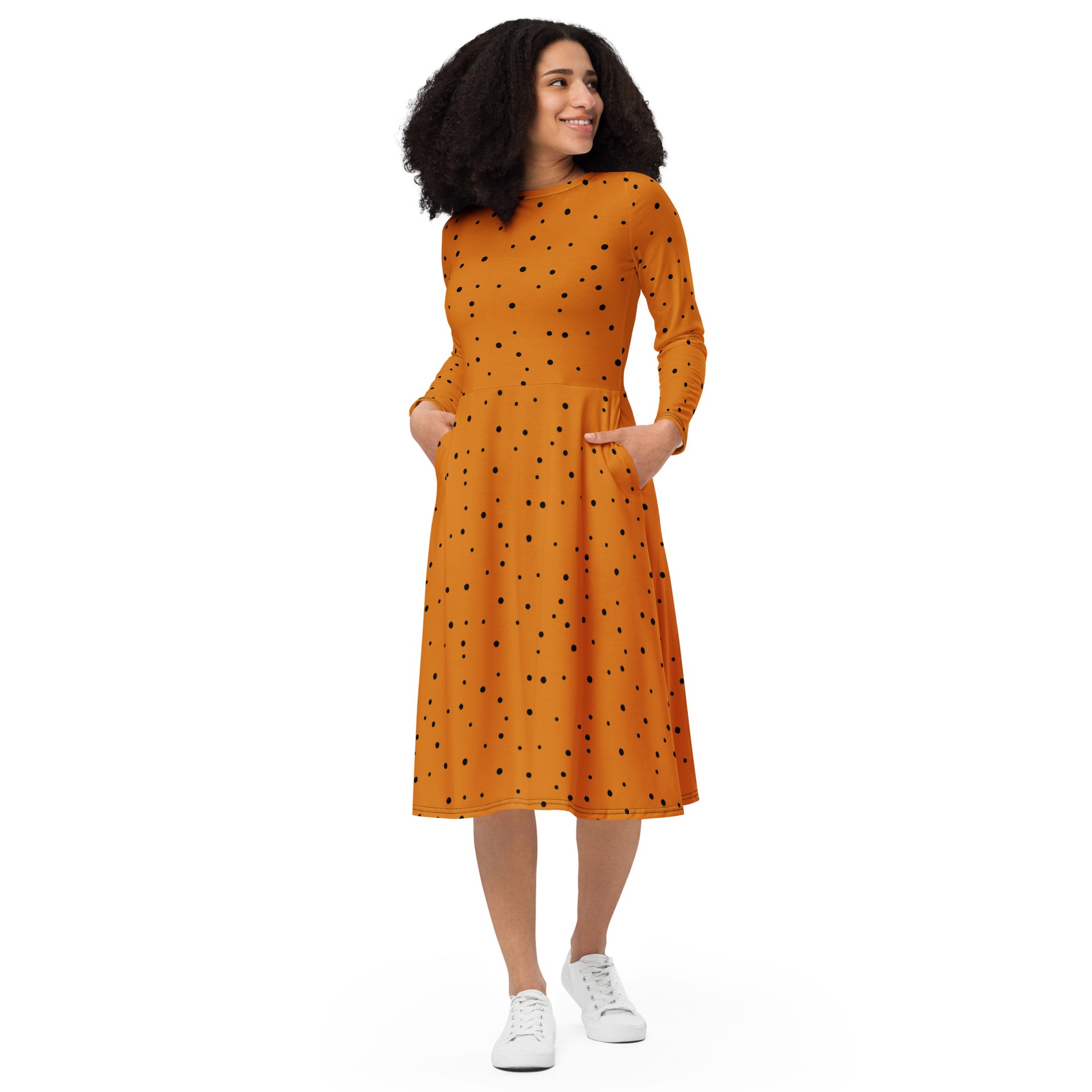 orange and black polka dot midi dress with sleeves